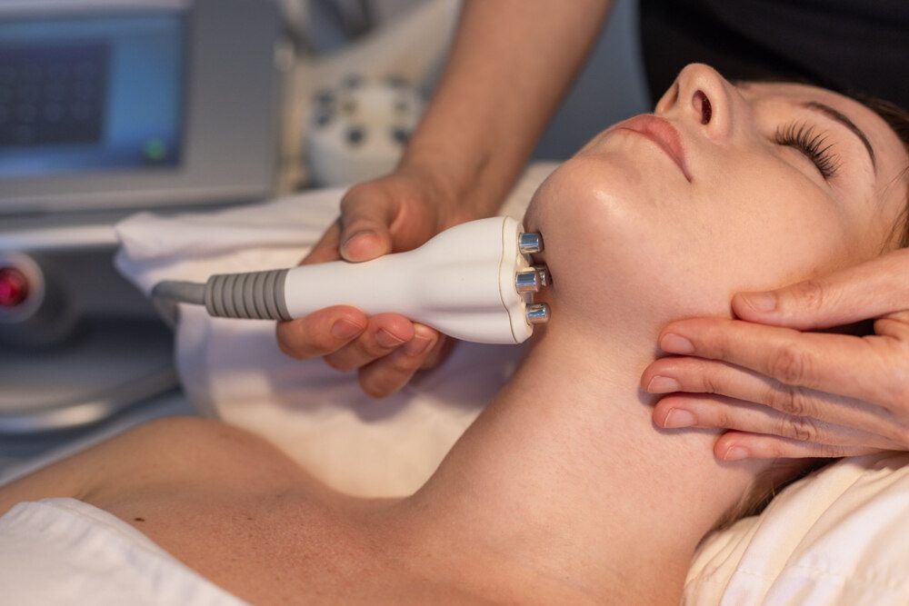 Radiofrequency skin tightening on the cheek and jawline at our Houston clinic